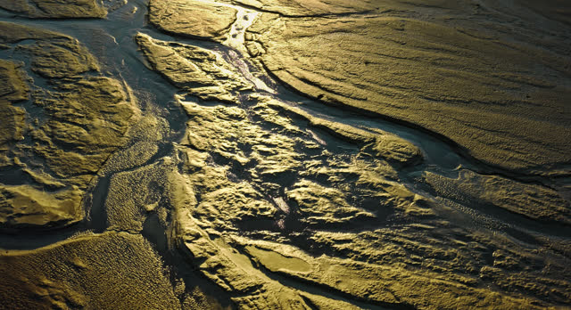 Forward Drone Shot of Shoshone River Bank near Cody, Wyoming at Sunset