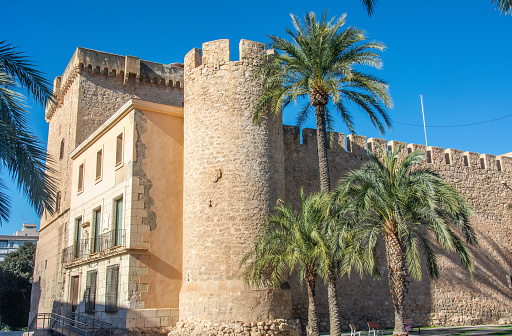 The Altamira Palace, also known as Alcazar de la Senoria, located in the center of the Spanish city of Elche, on the banks of the Vinalopo River ans surrounded with palm trees