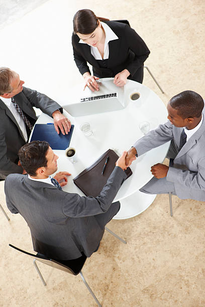 istock arial view of Business Group Working on a laptop 183802605