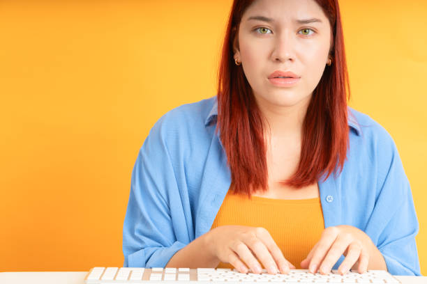 istock Young woman typing 1838027987
