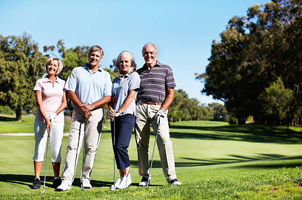 istock Group of golf players at the course smiling 183802849