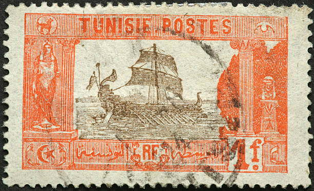 istock old sailing galley on a Tunsian postage stamp 183802880