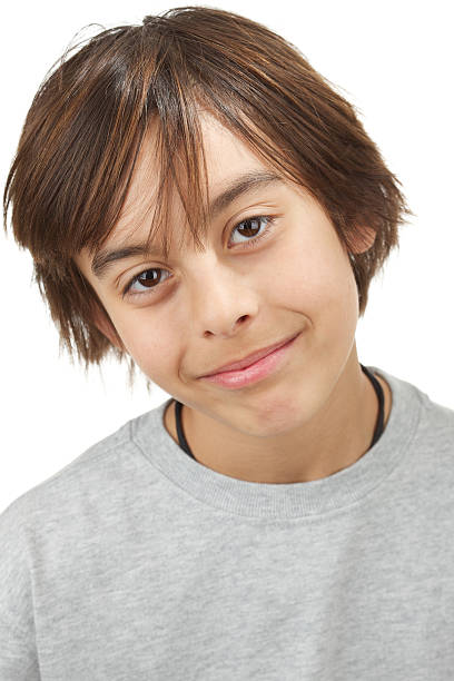 istock Young boy with gray t-shirt isolated on white 183803469