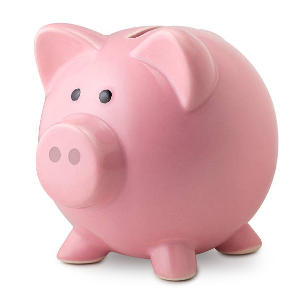 Piggy bank. Pink ceramic piggy bank.  Photography isolated on white in high resolution.Some similar pictures from my portfolio: bringing home the bacon stock pictures, royalty-free photos & images