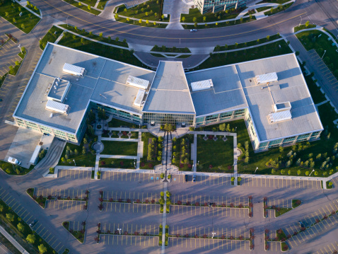 Aerial view of a modern business park with evening light.