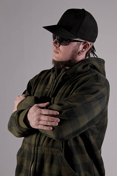 istock Young Man In Winter Coat and Baseball Cap 183804281