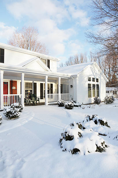 istock House Snow Home Winter Dawn Morning - Vertical 183805168