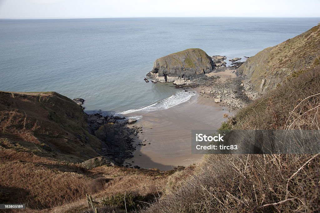 Enseada isolada no Cardiganshire Coast - Foto de stock de Areia royalty-free