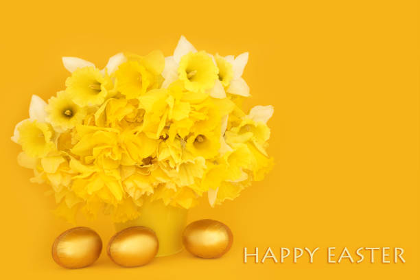Easter arrangement with bright flowers and Easter eggs