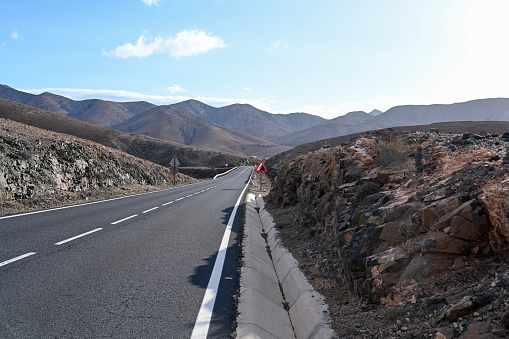 Pájara, Fuerteventura, Spain, November 24, 2023 - Winding road near between Pájara and La Pared, Fuerteventura, Canary Islands, Spain.