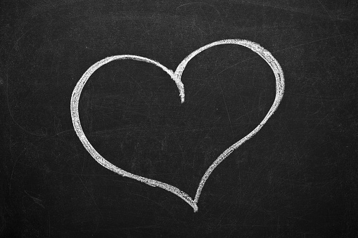 Drawing of a heart in a blackboard