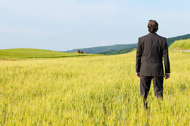 istock Businessman Standing in the Countryside.Copy Space 183806938
