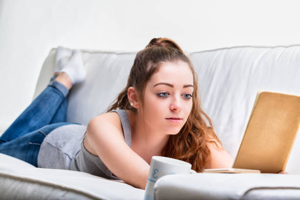 istock absorbing read, intense focus, story depths 1838073148
