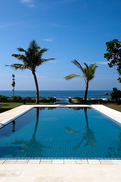 istock luxury villa swimming pool 183807666
