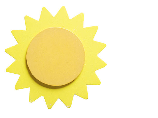 a wooden yellow sun art and craft isolated on white with copy space.