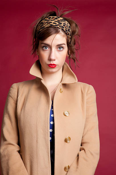 istock Young retro woman in coat 183807787