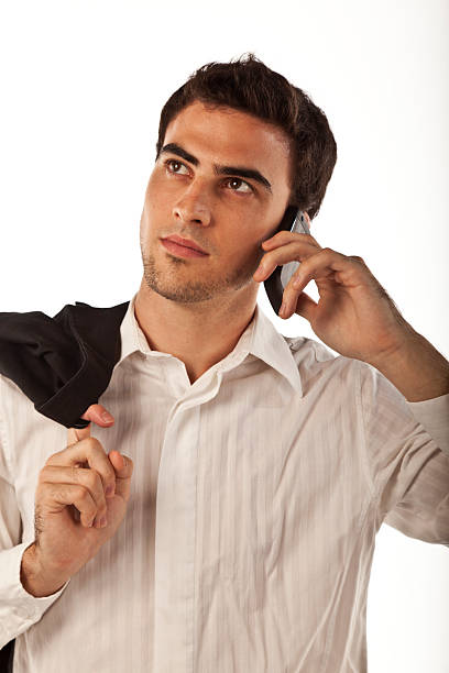 istock Young businessman talking on cell phone. 183808280