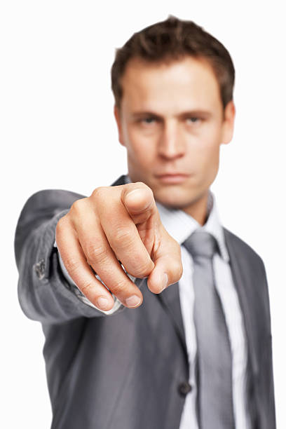 istock Serious business man pointing at you 183808383