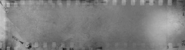 istock Film negatives grey background 1838084809