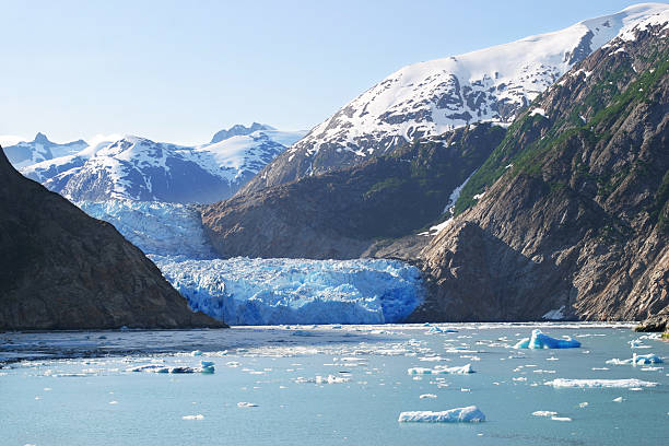 Sawyer glacier in Alaska mountains stock photo