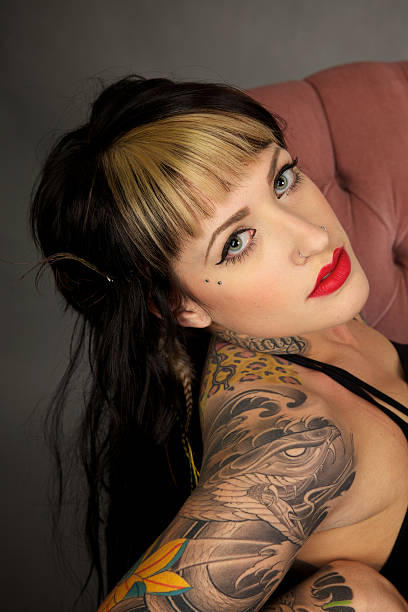 istock Beautiful Young Woman with Tattoos 183809309