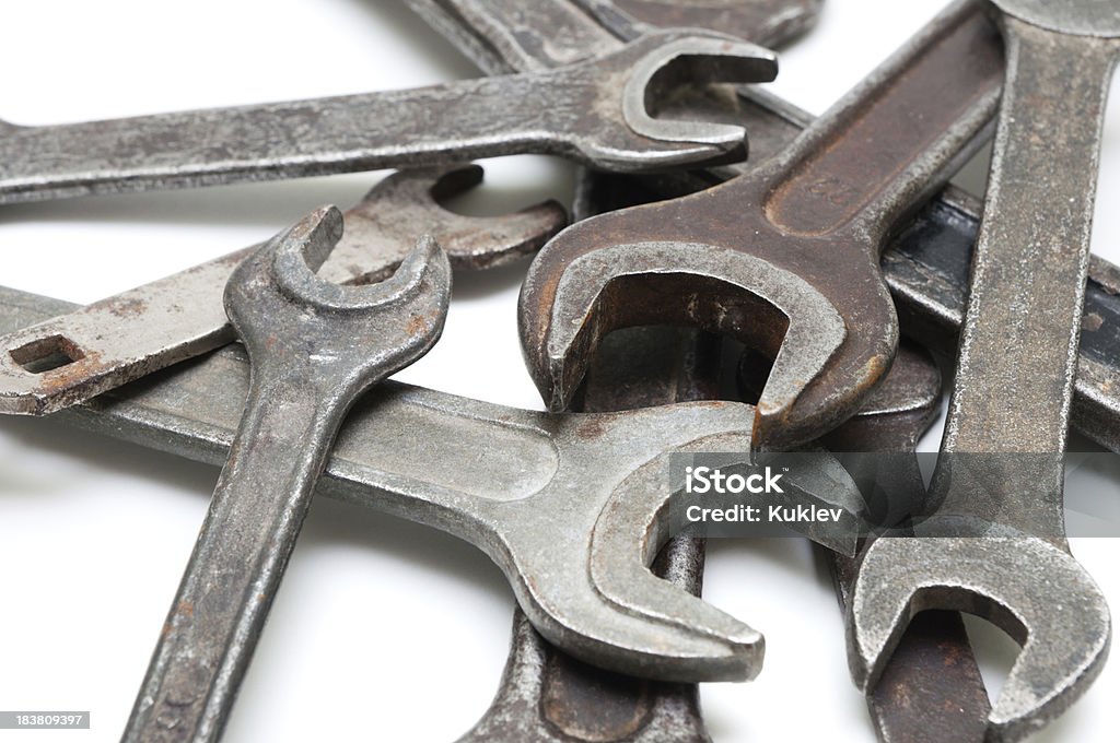 Wrench Lots of old dirty wrench on white background. Adjustable Wrench Stock Photo