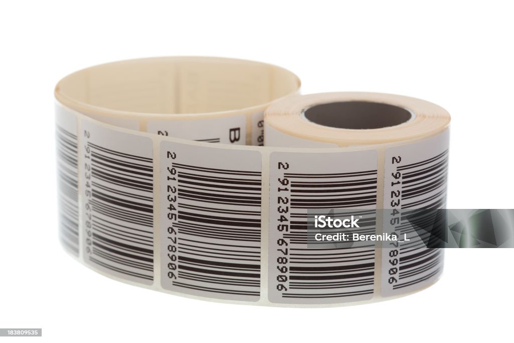 Barcode label ribbon "Barcode label ribbon with EAN-13 type code, isolated over white. All about bar-codes in my lightbox:" Label Stock Photo