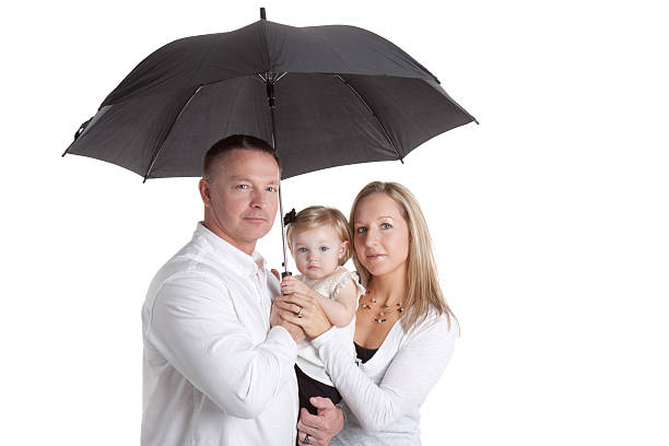 istock Family Under Umbrella 183809769