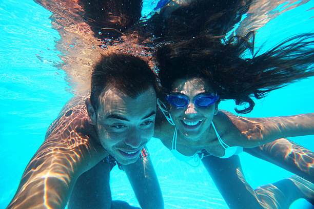 istock Couple snorkeling on the tropical beach 183810093