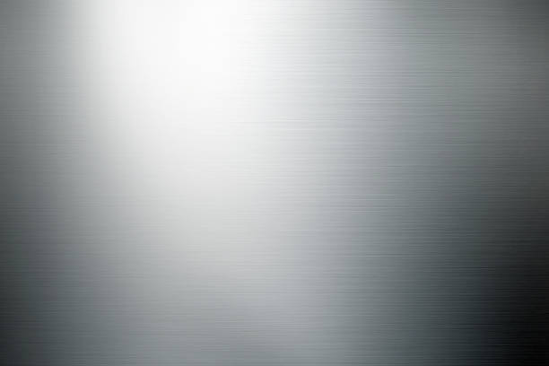 shiny brushed metal background close up shot of brushed metal surface. silver colored stock pictures, royalty-free photos & images