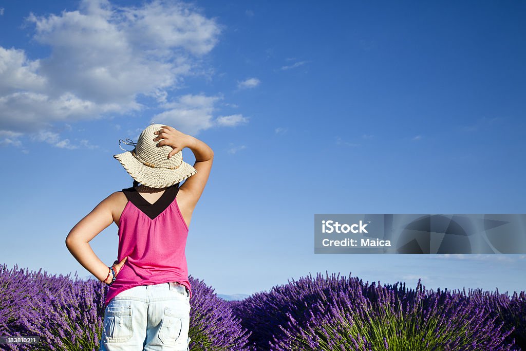 Child at lavender fiels Nine years old looking at full bloomed lavener fiels.Many more clicking on any photo: 8-9 Years Stock Photo