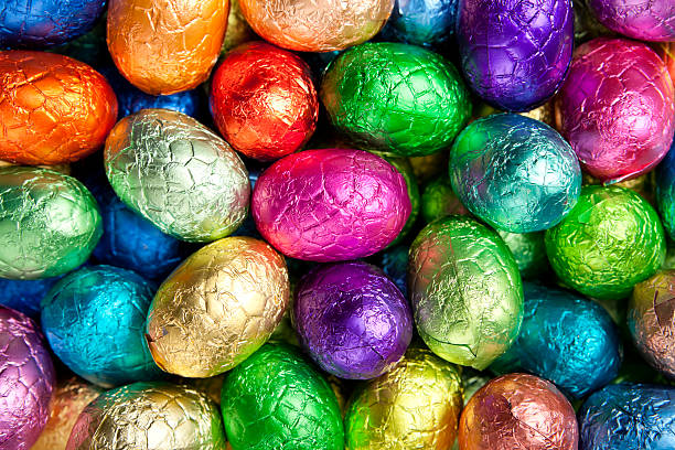 Multi-coloured chocolate Easter eggs stock photo