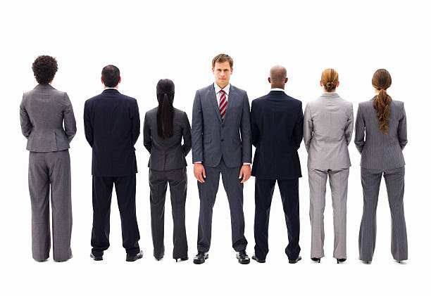 istock Businessman Standing Apart from the Crowd - Isolated 183810775
