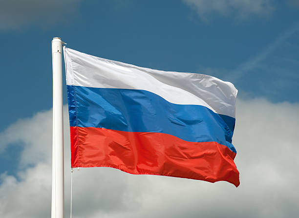 Russian flag The flag of Russia waving in the wind. russian flag stock pictures, royalty-free photos & images