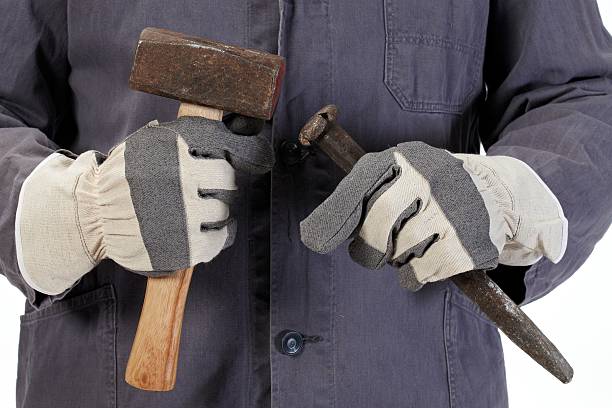 istock Craftsman close up showing hammer and chisel 183810825