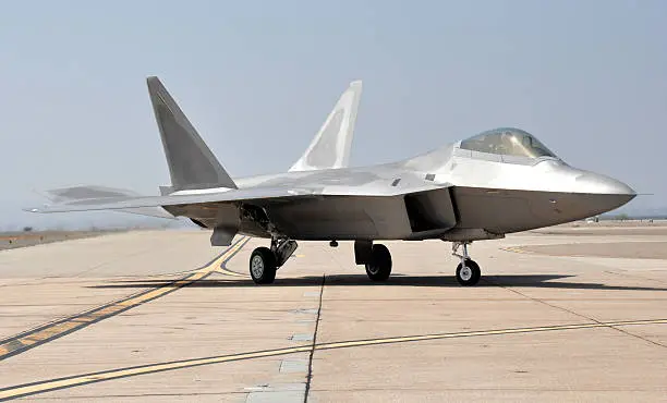 "An F-22 Raptor stealth fighter taxiing at Miramar MCAS, San Diego, California."