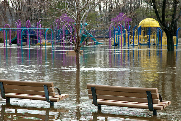 istock flooded county park with kids playground after extensive rain fall 183810974