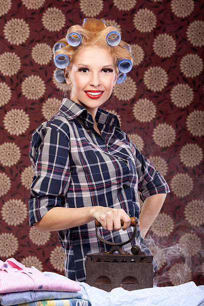 istock Housewife ironing portrait 183811383