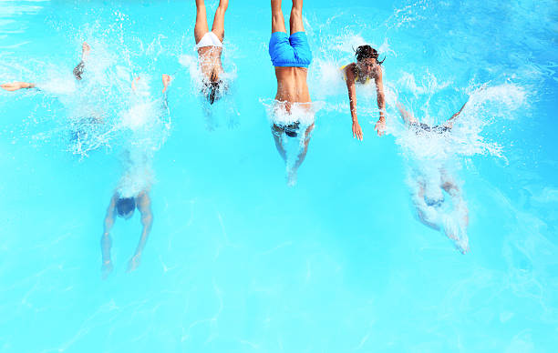 istock Group of people jumping to the pool. 183812480