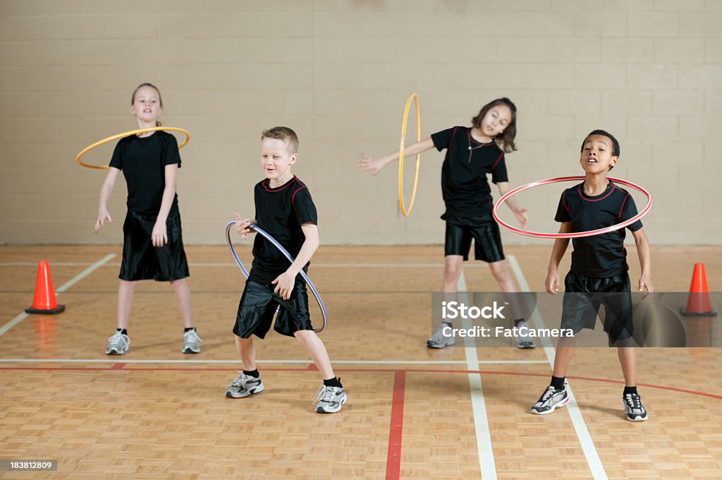 Hula hoop Children in gym class with hula hoops Active Lifestyle Stock Photo