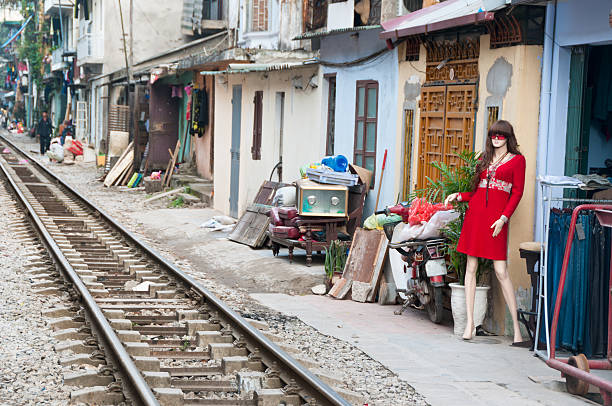 istock Shops And Homes Next to The Railroad In Hanoi 183812844