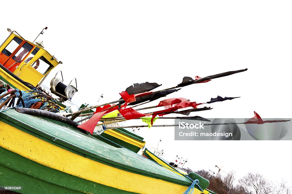 À quai de bateaux de pêche en hiver - Photo de Balise flottante libre de droits