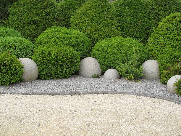 Crushed stone texture background. Coarse gravel. Granite crushed stone. Construction materials.\nThis image was taken with a mobile phone.