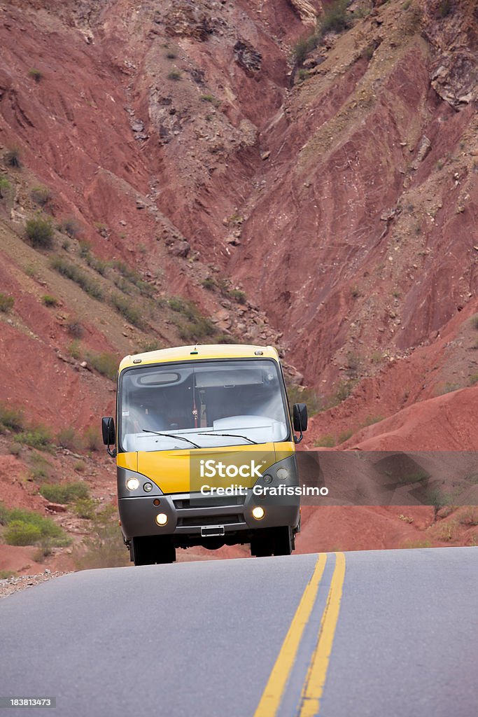 Bus travelling on highway through wilderness of Argentina  Argentina Stock Photo