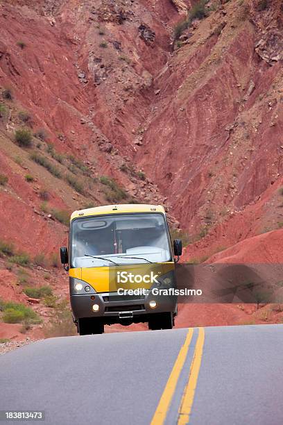 Bus Travelling On Highway Through Wilderness Of Argentina Stock Photo - Download Image Now