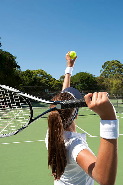 istock Female tennis player getting ready to serve. 183813566