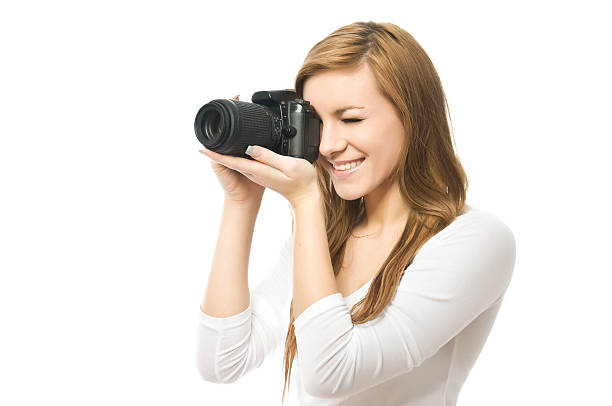 istock Click! - Young female photographer 183813914