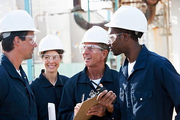 Diverse group of workers at manufacturing plant