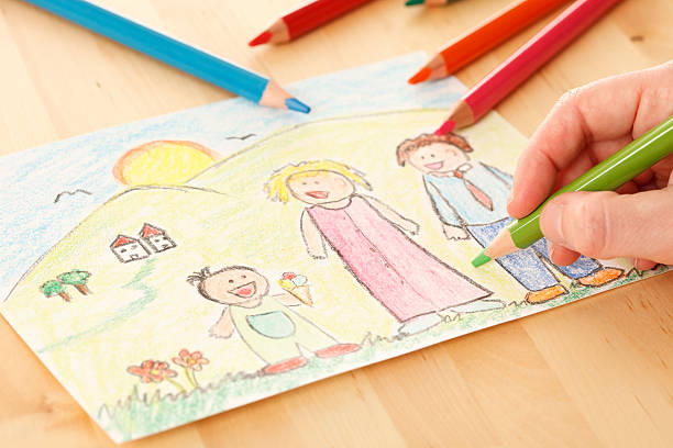 istock Children's drawing on desk 183814188