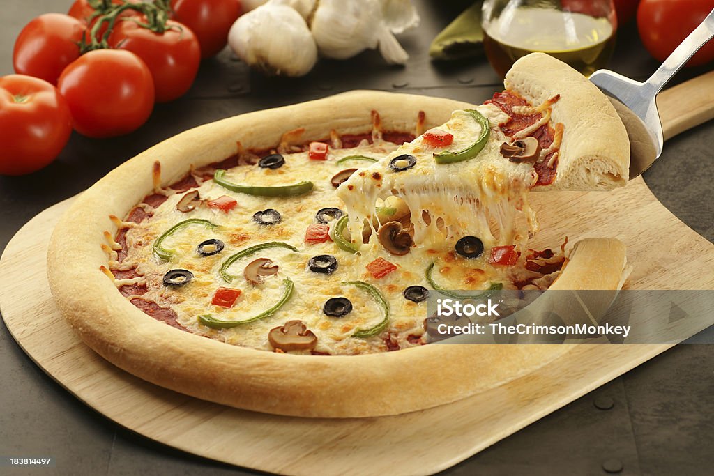 Pizza vegetariano Pull - Foto stock royalty-free di Pizza